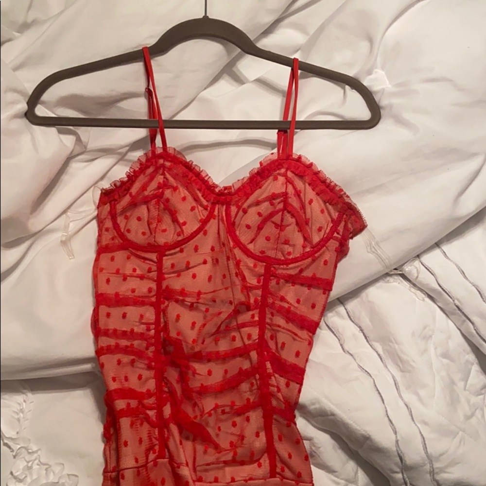 Red polka dot bodysuit